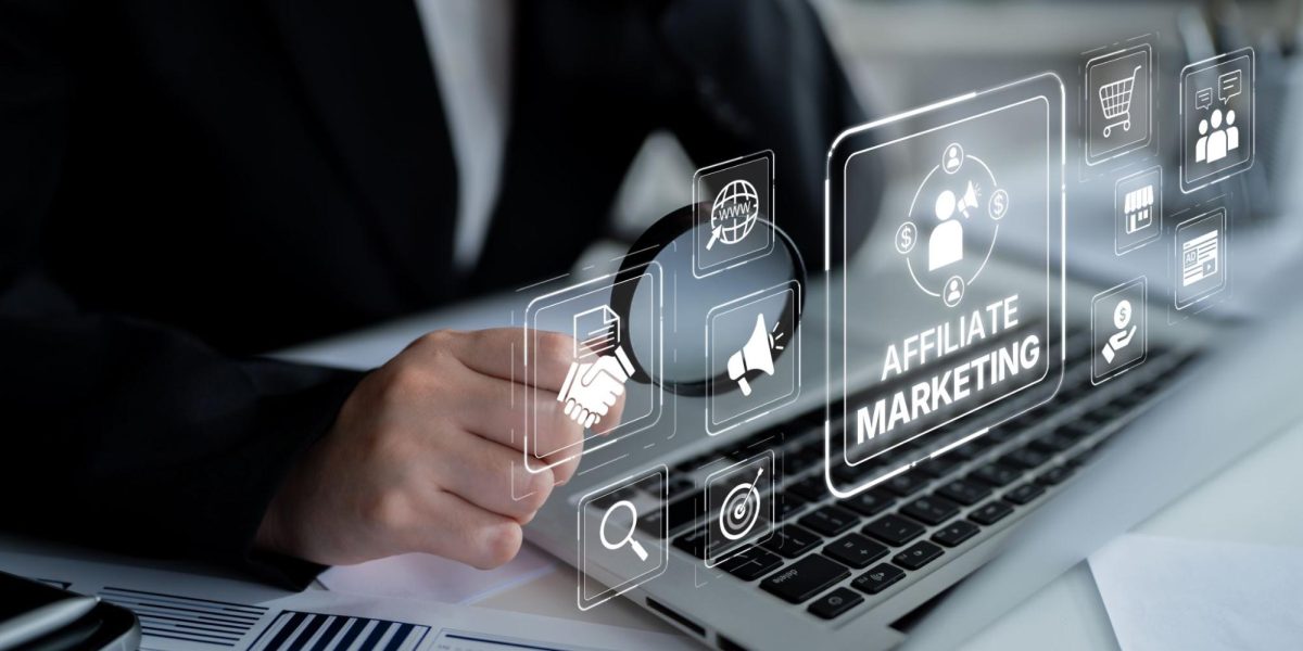affiliate marketing concept on laptop with digital marketing icons