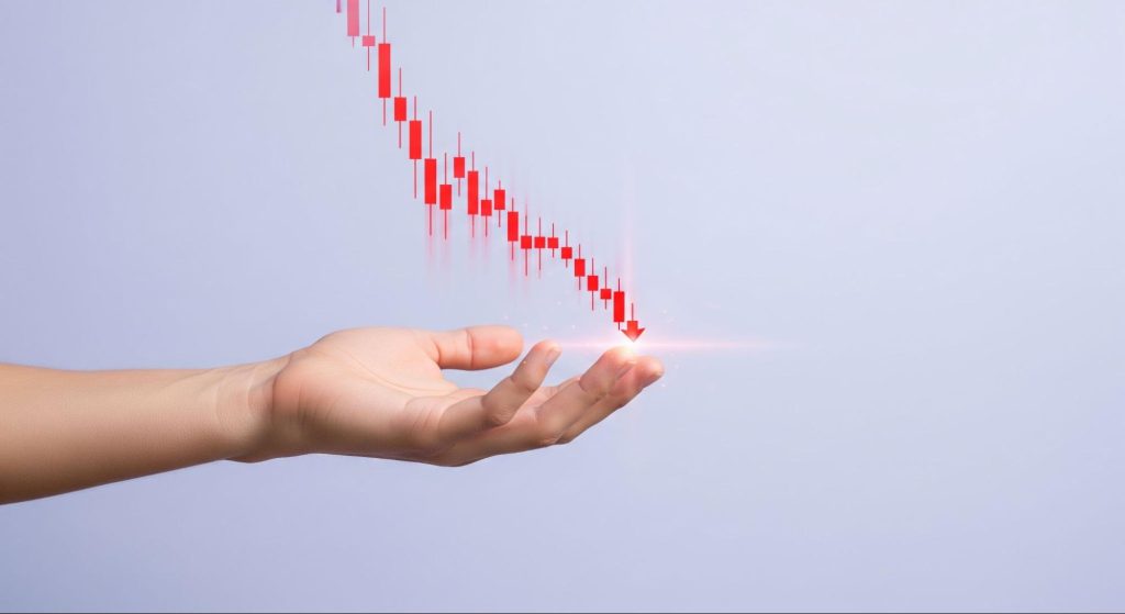 falling stock market chart representing financial loss